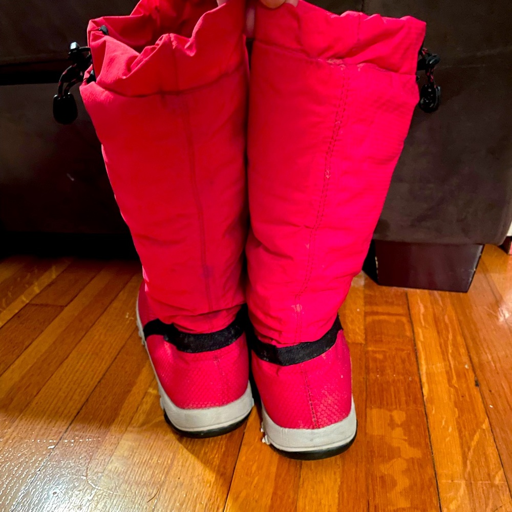 Bright red boots. Very warm and eye-catching.